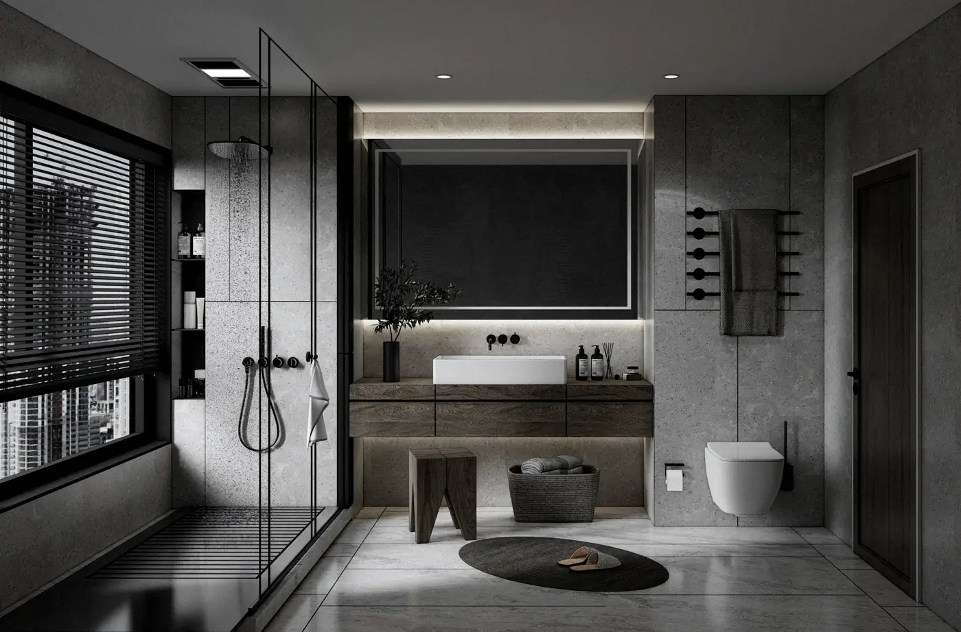 Salle de bain aux tons minéraux sombres : douche vitrée, vasque posée et banc